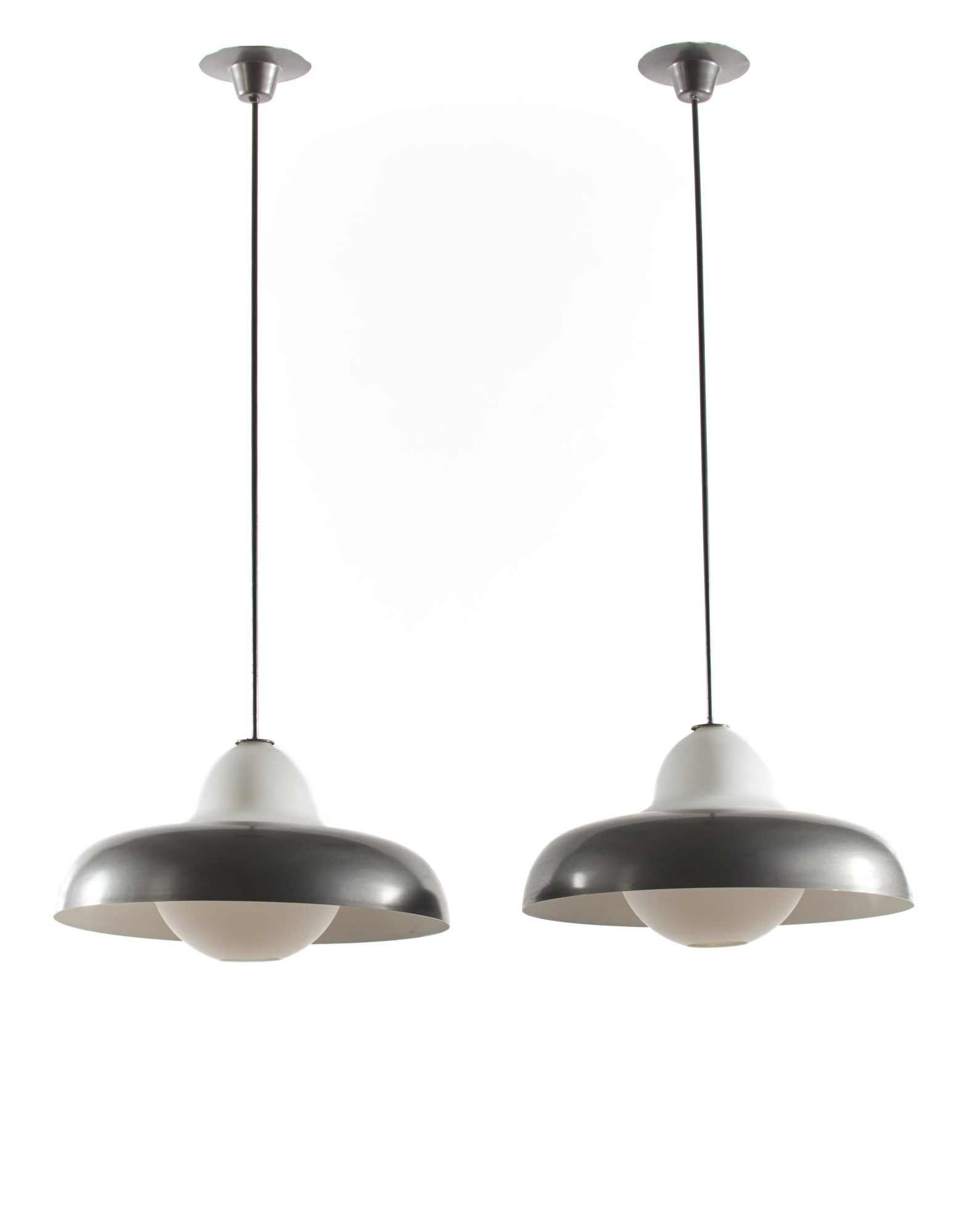 Luigi Caccia Dominioni (Milano 1913 - 2016) Pair of suspension lamps model "LS8 Carolina". Produced: Luigi Caccia Dominioni (Milano 1913 - 2016) Pair of suspension lamps model "LS8 Carolina". Produced by Azucena, Milan, 1960s. Gray metallic aluminum reflector, matte opaline glass screen and diffuser,
