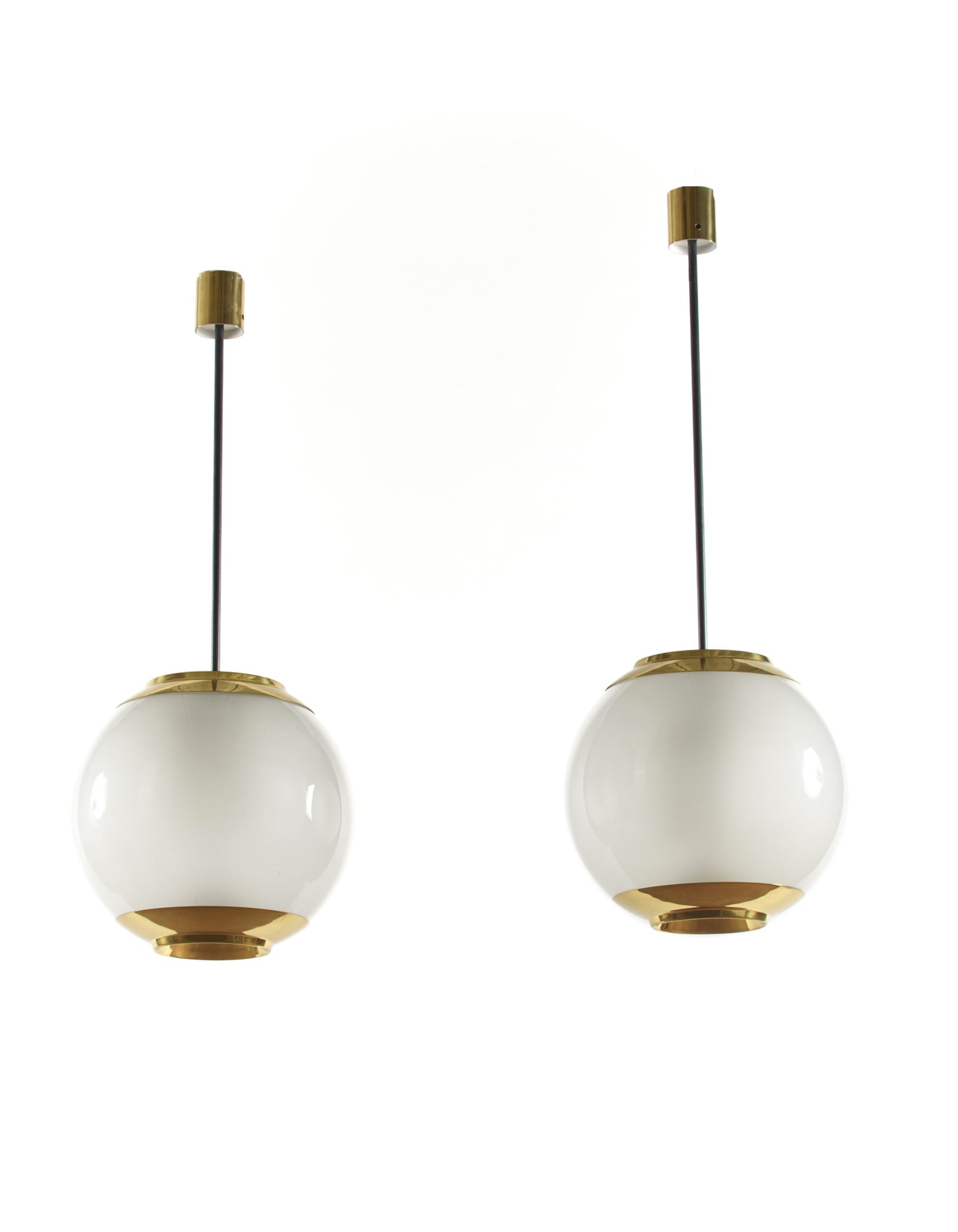 Luigi Caccia Dominioni (Milano 1913 - 2016) Pair of suspension lamps model "LS2". Produced by: Luigi Caccia Dominioni (Milano 1913 - 2016) Pair of suspension lamps model "LS2". Produced by Azucena, Milan, disegno del 1952. Brass and frosted glass on the inner surface. (h 120 cm.) (slight defect