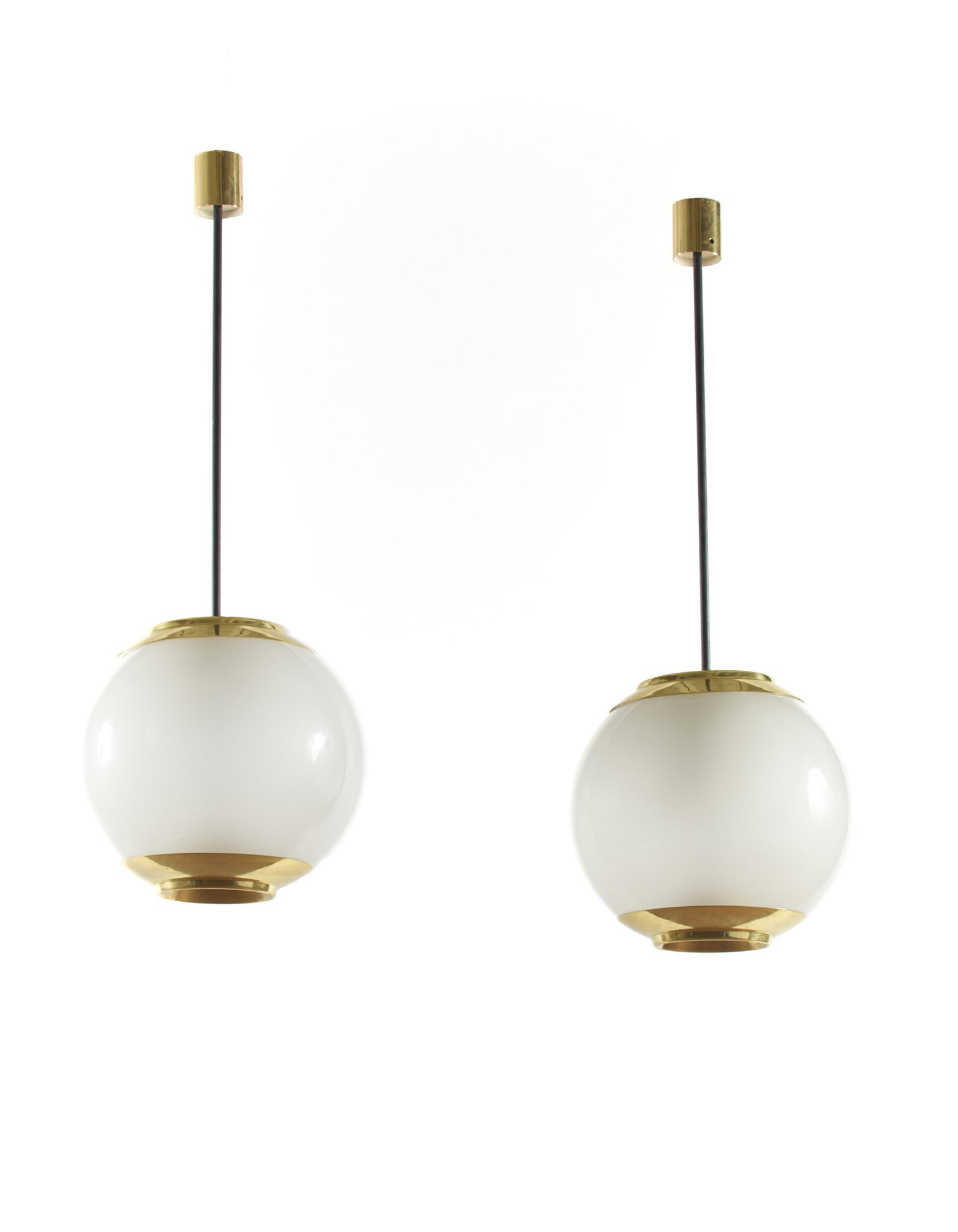Luigi Caccia Dominioni (Milano 1913 - 2016) Pair of suspension lamps model "LS2". Produced by: Luigi Caccia Dominioni (Milano 1913 - 2016) Pair of suspension lamps model "LS2". Produced by Azucena, Milan, disegno del 1952. Brass and frosted glass on the inner surface. (h 120 cm.) Literature "Do