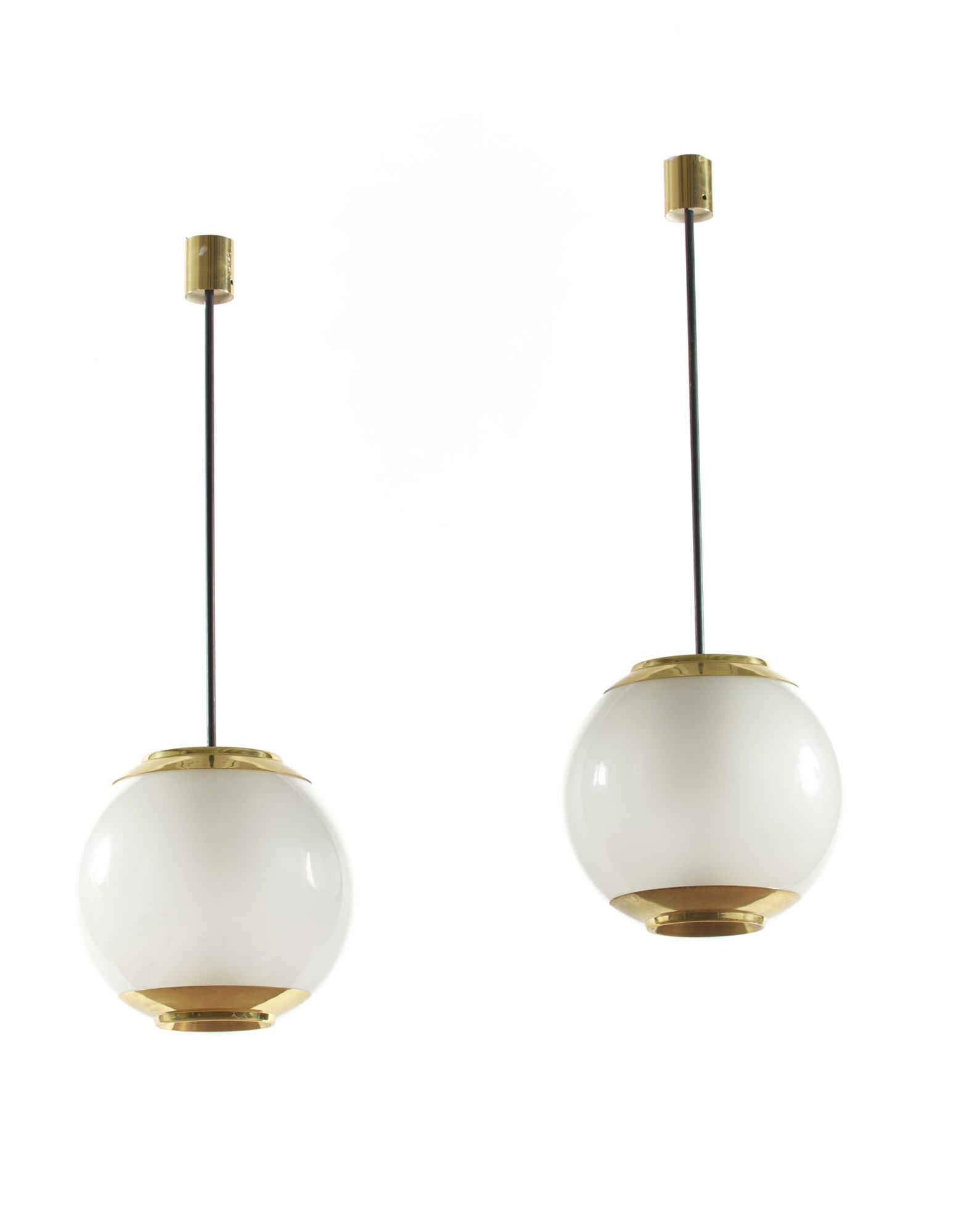 Luigi Caccia Dominioni (Milano 1913 - 2016) Pair of suspension lamps model "LS2". Produced by: Luigi Caccia Dominioni (Milano 1913 - 2016) Pair of suspension lamps model "LS2". Produced by Azucena, Milan, disegno del 1952. Brass and frosted glass on the inner surface. (h 120 cm.) Literature "Do