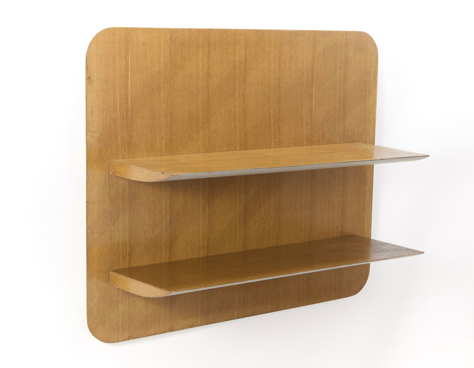 Gio Ponti (Milano 1891 - 1979) Two-shelf wall bookcase. Execution by Giordano Chiesa, Milan, 1951ca.: Gio Ponti (Milano 1891 - 1979) Two-shelf wall bookcase. Execution by Giordano Chiesa, Milan, 1951ca. Oak wood veneer and painted white. (85.5x105.5x34 cm.) Provenance Lucano House, San Remo; Finarte,