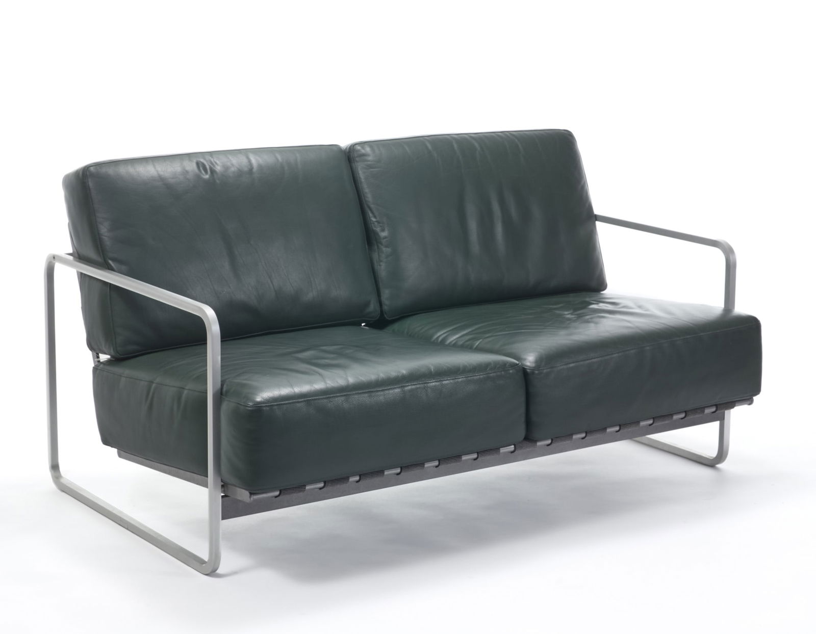 Alfredo Haberli (Buenos Aires 1964) Two-seater sofa model "Zurigo". Produced by Zanotta, Italy,: Alfredo Haberli (Buenos Aires 1964) Two-seater sofa model "Zurigo". Produced by Zanotta, Italy, 1990s. Metal frame and green leather upholstery. (144x80x98 cm.) IT Divano a due posti modello "Zurigo".