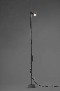Tito Agnoli (Lima 1931 - Milano 2012) Floor lamp model "387". Produced by O-Luce, Italy, 1954.: Tito Agnoli (Lima 1931 - Milano 2012) Floor lamp model "387". Produced by O-Luce, Italy, 1954. Nickel-plated metal stem, travertine base. (h 202 cm.) (slight defects) Literature G. Gramigna, Repertori