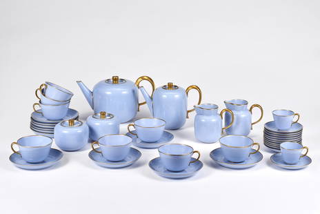 Gio Ponti (Milano 1891 - 1979) Part of light blue porcelain tea and coffee service with gilt: Gio Ponti (Milano 1891 - 1979) Part of light blue porcelain tea and coffee service with gilt profiles and handles comprising: teapot, coffee pot, two milk jugs, two sugar bowls, six teacups with eleve
