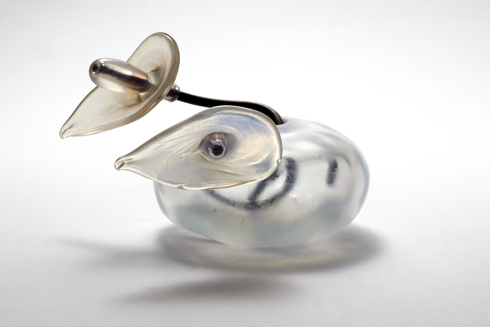 Giorgio Vigna (Verona 1955) Vase sculpture model "Fuochi Iridati". Execution by Venini, Murano,: Giorgio Vigna (Verona 1955) Vase sculpture model "Fuochi Iridati". Execution by Venini, Murano, 2002. Iridescent blown glass on outer surface, copper calla lily stems. Engraved inscription under the b