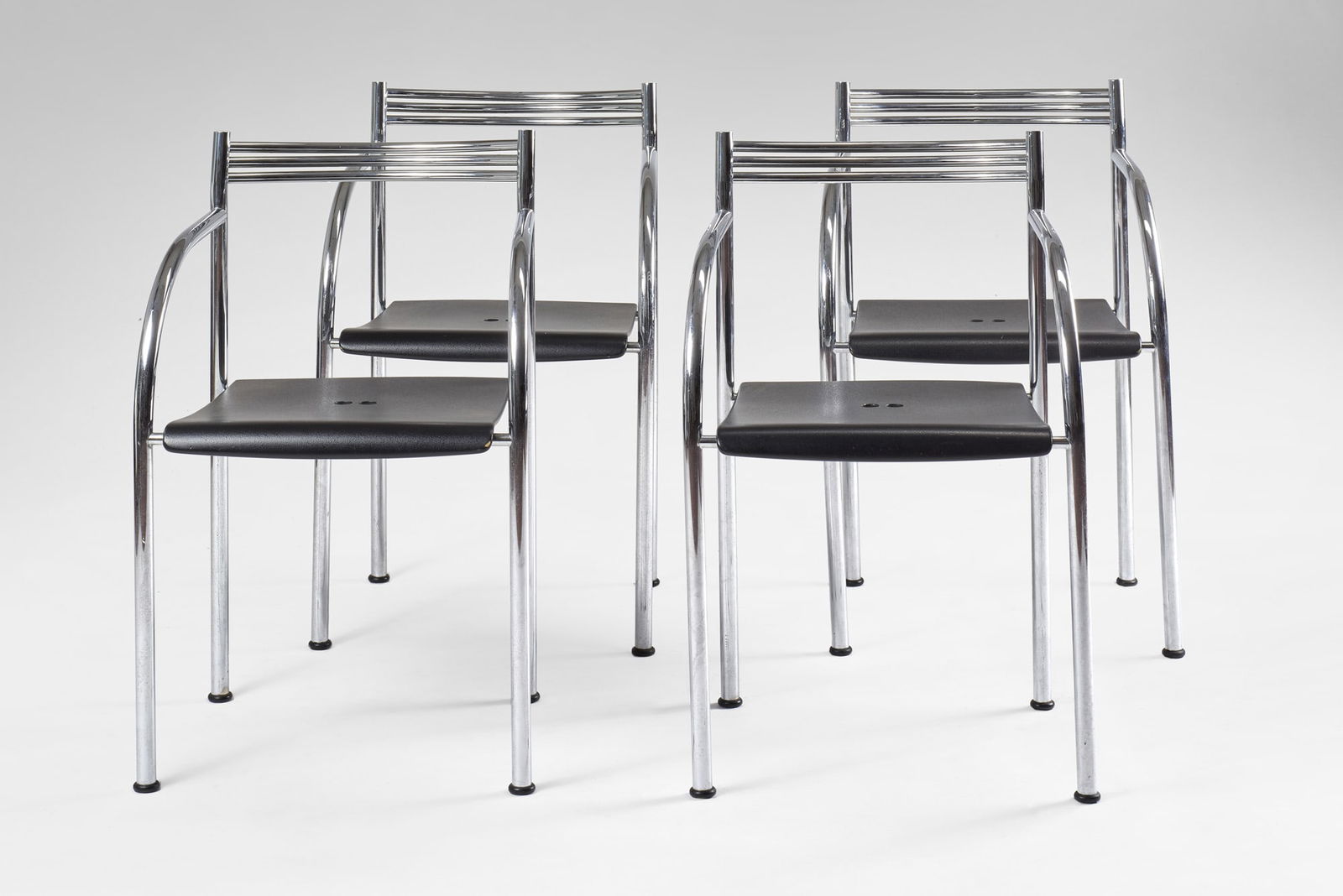 Philippe Starck (Parigi 1949) Four chairs model "Francesca Spanish". Produced by Baleri, Italy,: Philippe Starck (Parigi 1949) Four chairs model "Francesca Spanish". Produced by Baleri, Italy, 1984. Black plastic seat and chrome-plated metal frame. Bearing manufacturer's label. (slight defects) I