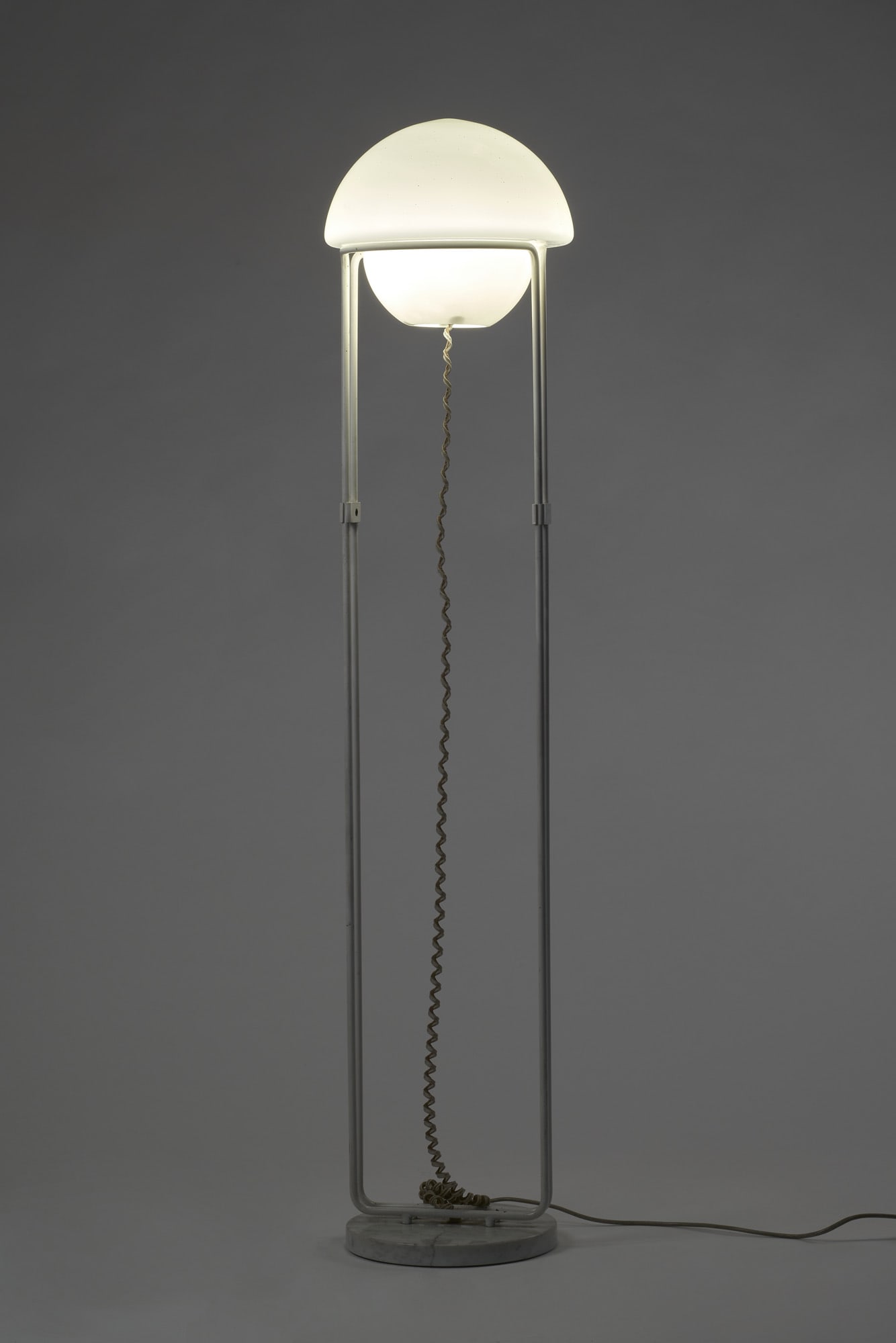 Roberto Pamio Floor lamp. Produced by Peguri, Italy, 1966ca. White lacquered metal, lacquered: Roberto Pamio Floor lamp. Produced by Peguri, Italy, 1966ca. White lacquered metal, lacquered glass. (h 164 cm.) (slight defects) Literature Rivista dell’Arredamento n. 137, maggio 1966, p. 25 IT La