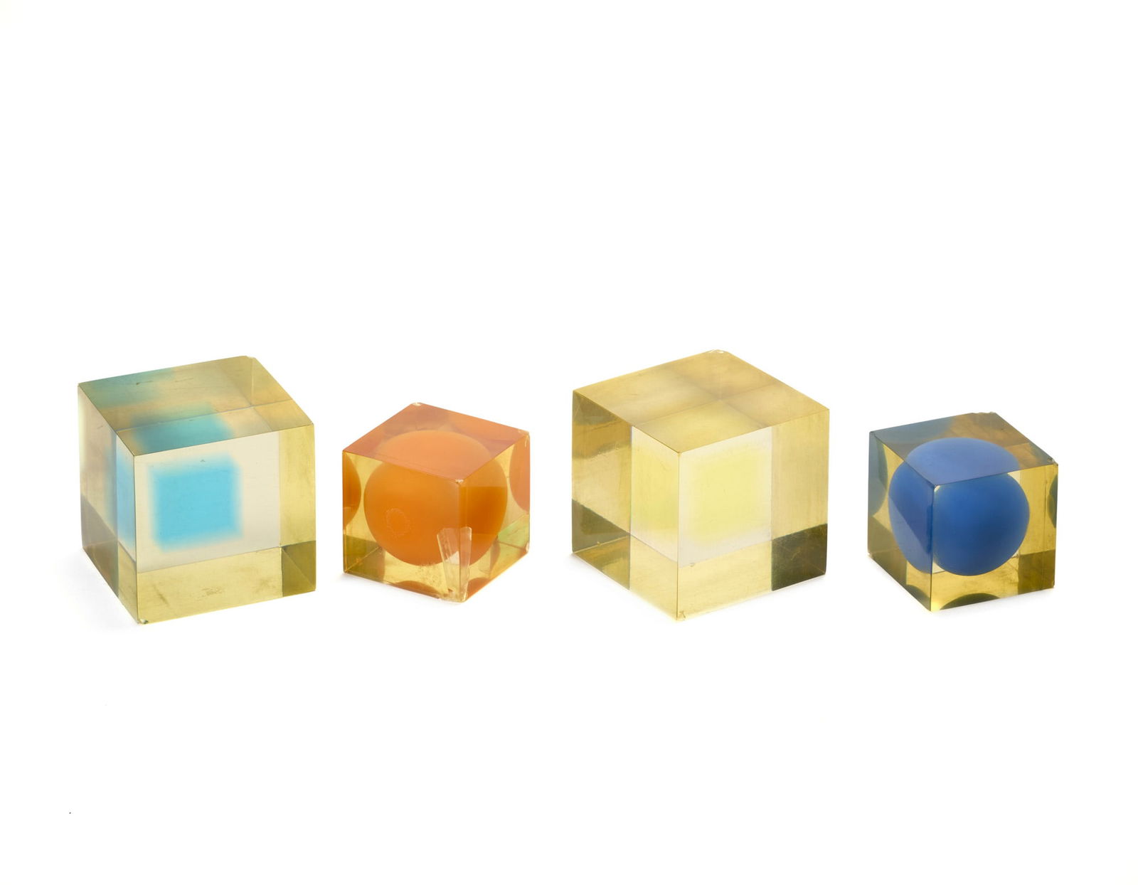 Enzo Mari (Novara 1932 - Milano 2020) Set of four colorless amber polyester resin cubes, two (1 of 1)