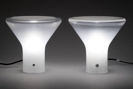 Angelo Mangiarotti (Milano 1921 - 2012) Two table lamps model "Chierico - Accelsa". Produced by: Angelo Mangiarotti (Milano 1921 - 2012) Two table lamps model "Chierico - Accelsa". Produced by Pollux Skipper, Italy, 1985. Lattimo and opalescent blown glass. (h 22 cm.) (slight defects) Provenance