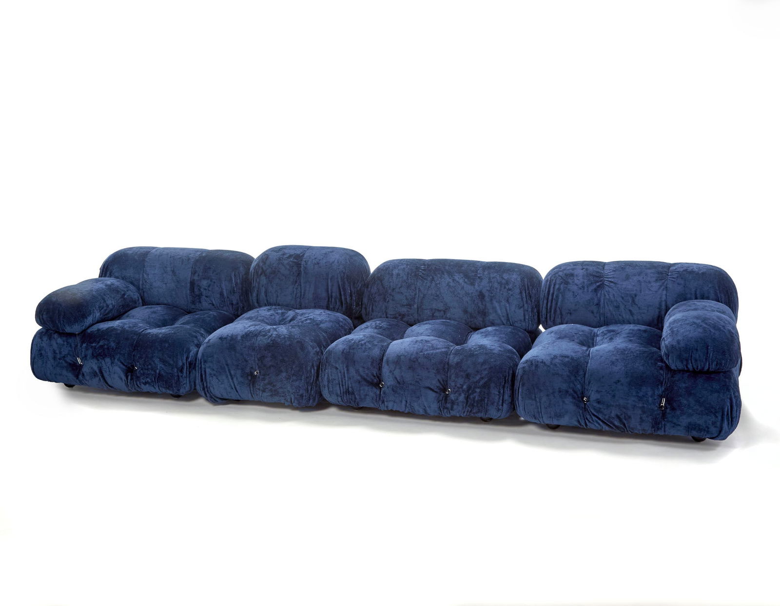 Mario Bellini (Milano 1935) Sofa model "Camaleonda". Produced by B&B, Novedrate, 1973ca. Four: Mario Bellini (Milano 1935) Sofa model "Camaleonda". Produced by B&B, Novedrate, 1973ca. Four modules covered in blue chenille, original Gavina fabric. Structure in plywood, polyurethane foam, snap ho