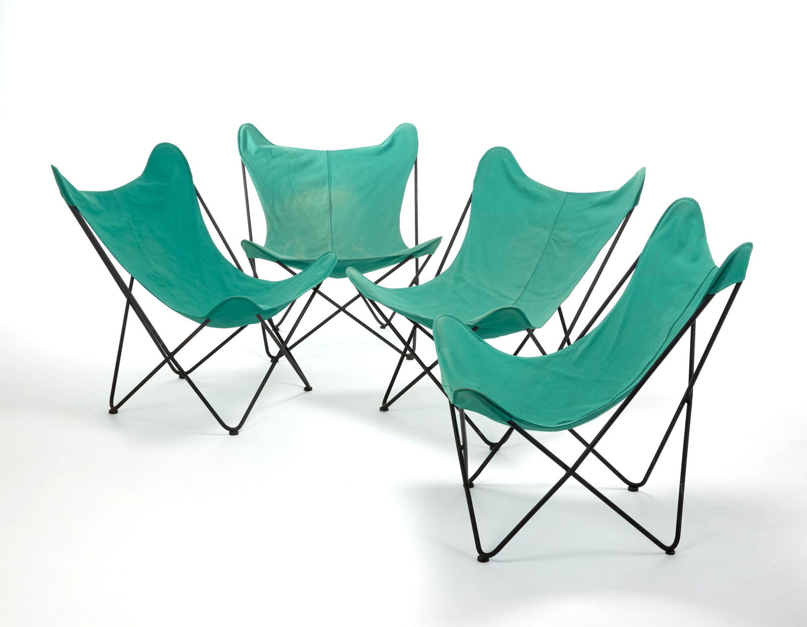 Four ‘Tripoline’ armchairs in black tubular metal with green fabric seats. Italy, 1970s.: Four ‘Tripoline’ armchairs in black tubular metal with green fabric seats. Italy, 1970s. (78x89x80 cm.) (defects) IT Quattro poltrone "Tripoline" in metallo tubolare nero e seduta in tessuto verde