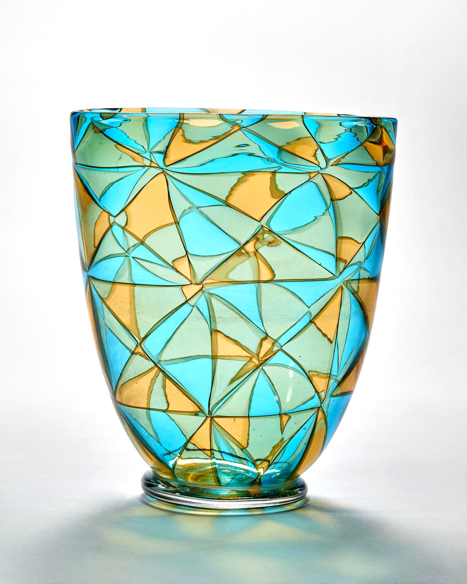 Barovier e Toso Vase of the series "Intarsio". Murano, 1960s/1970s. Triangular tiles in pagliesco: Barovier e Toso Vase of the series "Intarsio". Murano, 1960s/1970s. Triangular tiles in pagliesco and turquoise glass. Engraved signature and place under the base. (h 23 cm.) Literature Per esemplari