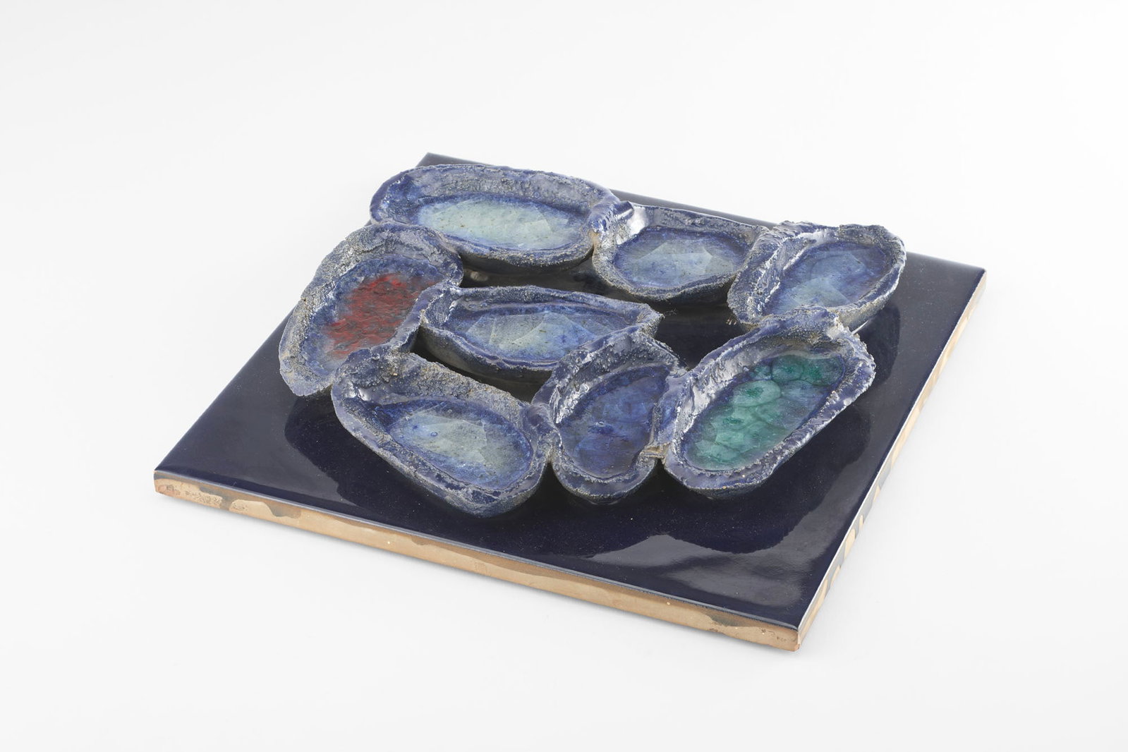 Fausto Melotti (Rovereto 1901 - Milano 1986) Tile. 1955ca. Polychrome glazed ceramic in shades of (1 of 3)