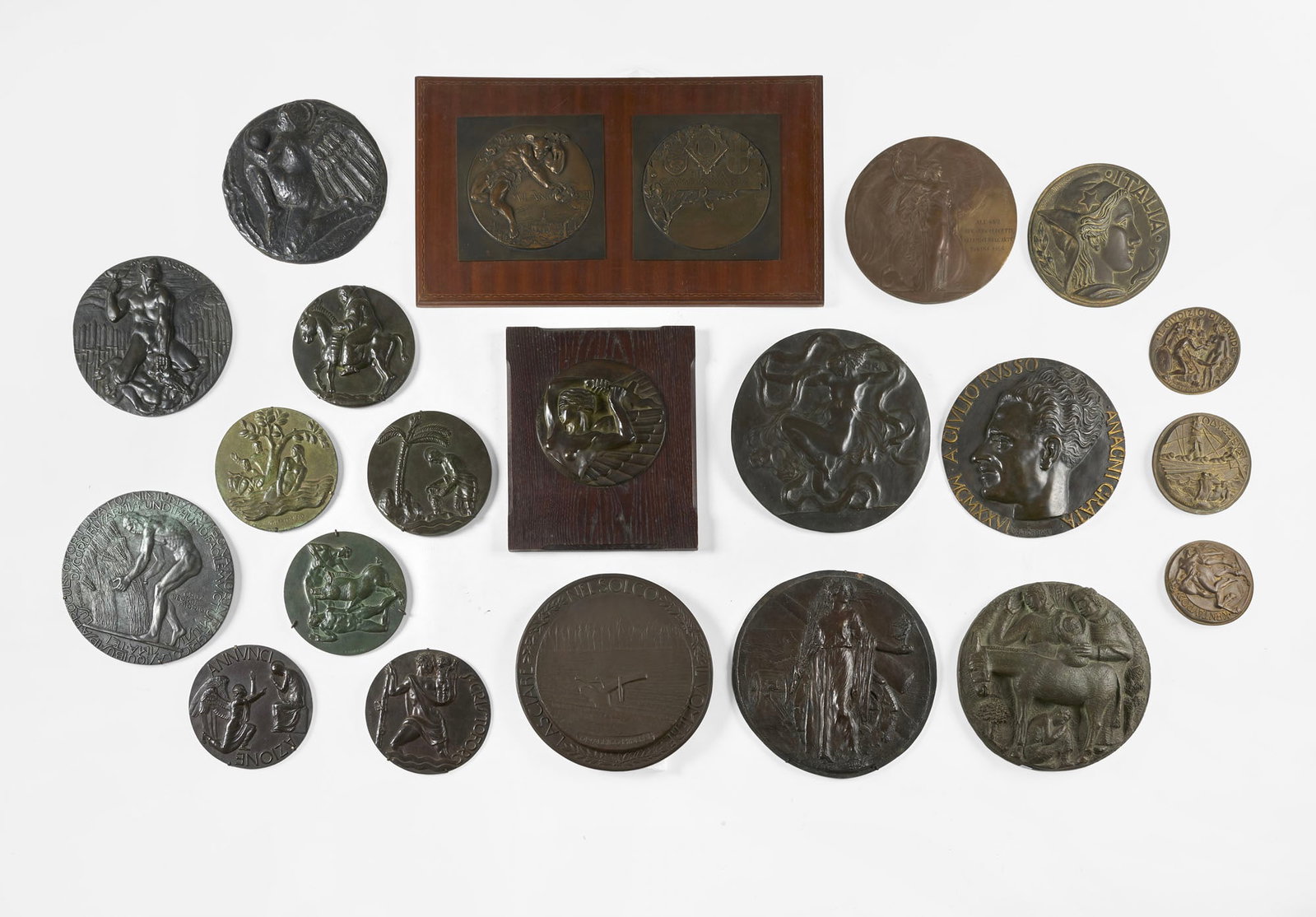 A collection of twenty-two bronze medallions featuring relief figures by sculptors active between (1 of 8)