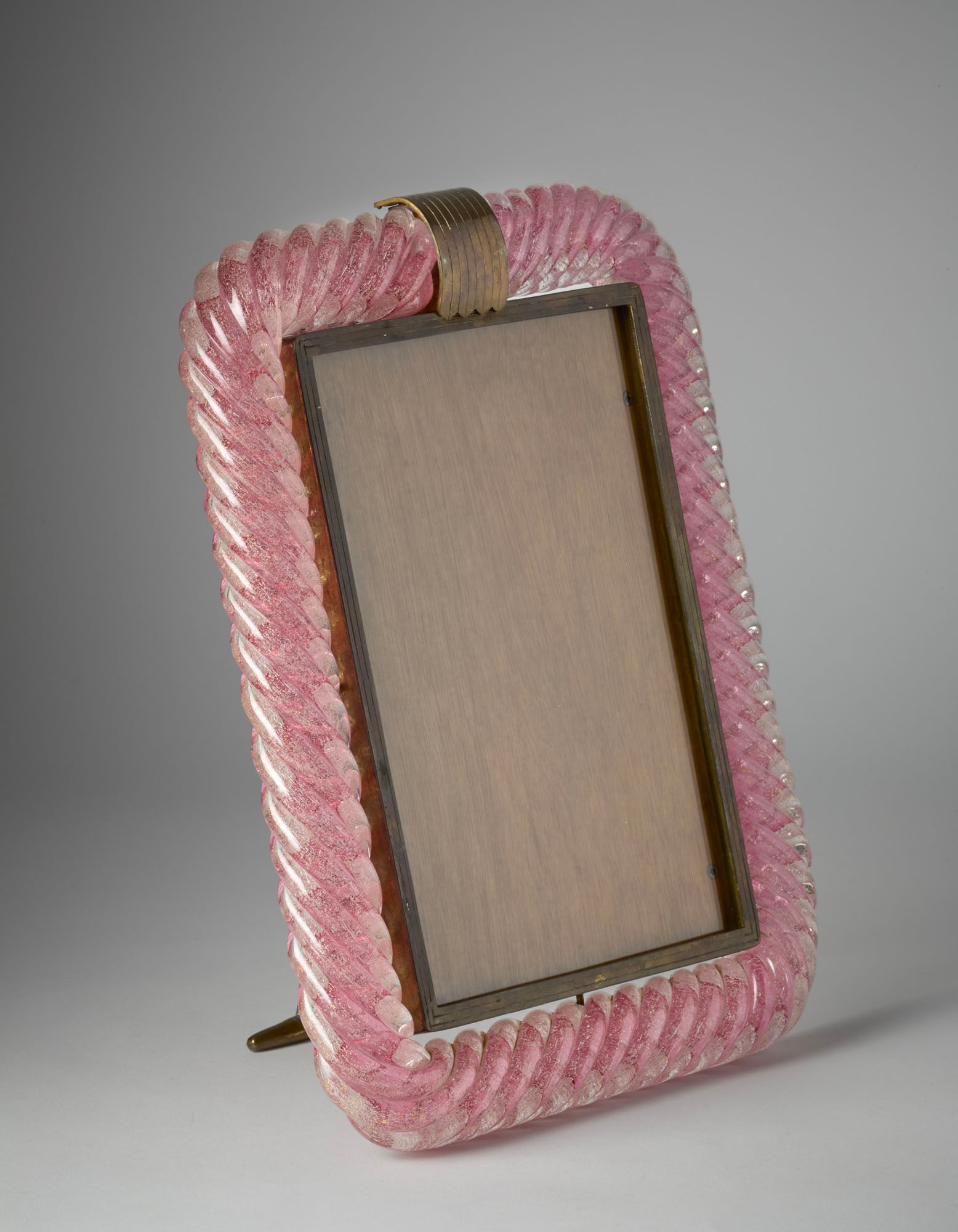 Venini * Frame. Murano, 1937ca. Pink braided pulegoso blown glass, brass. Marked by incision on the (1 of 1)