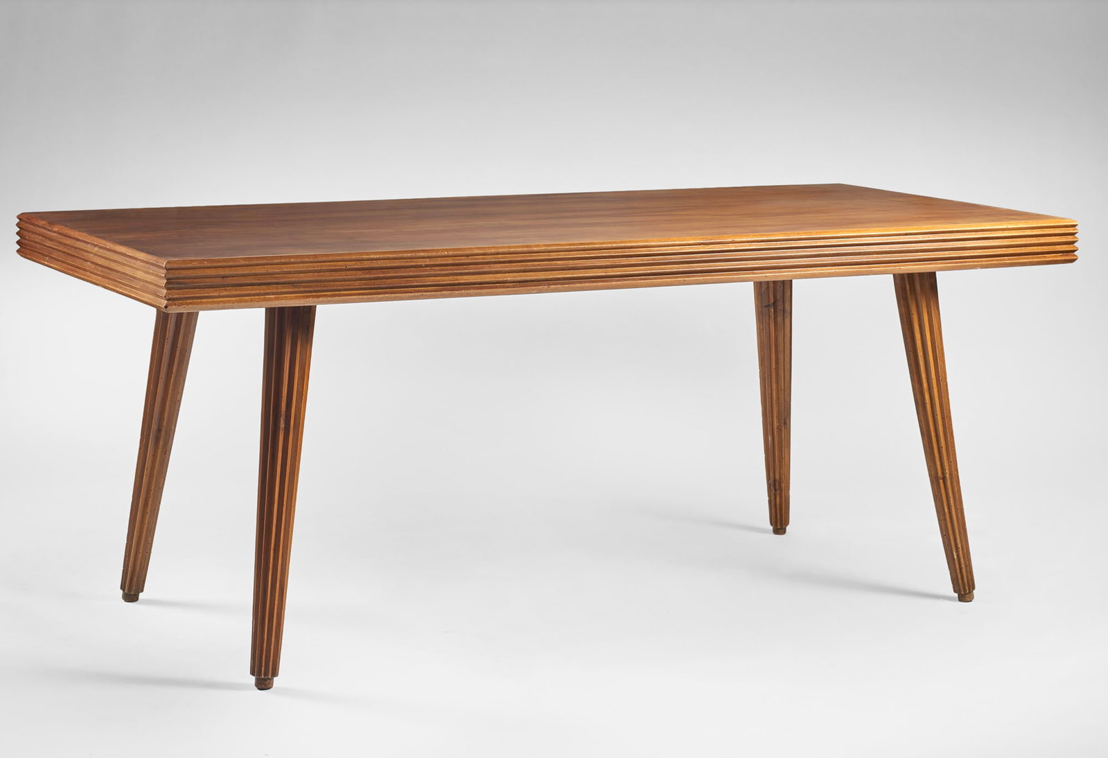 Gio Ponti (Milano 1891 - 1979) Solid wood table with grooves, edging, and veneer. Milan, (1 of 1)