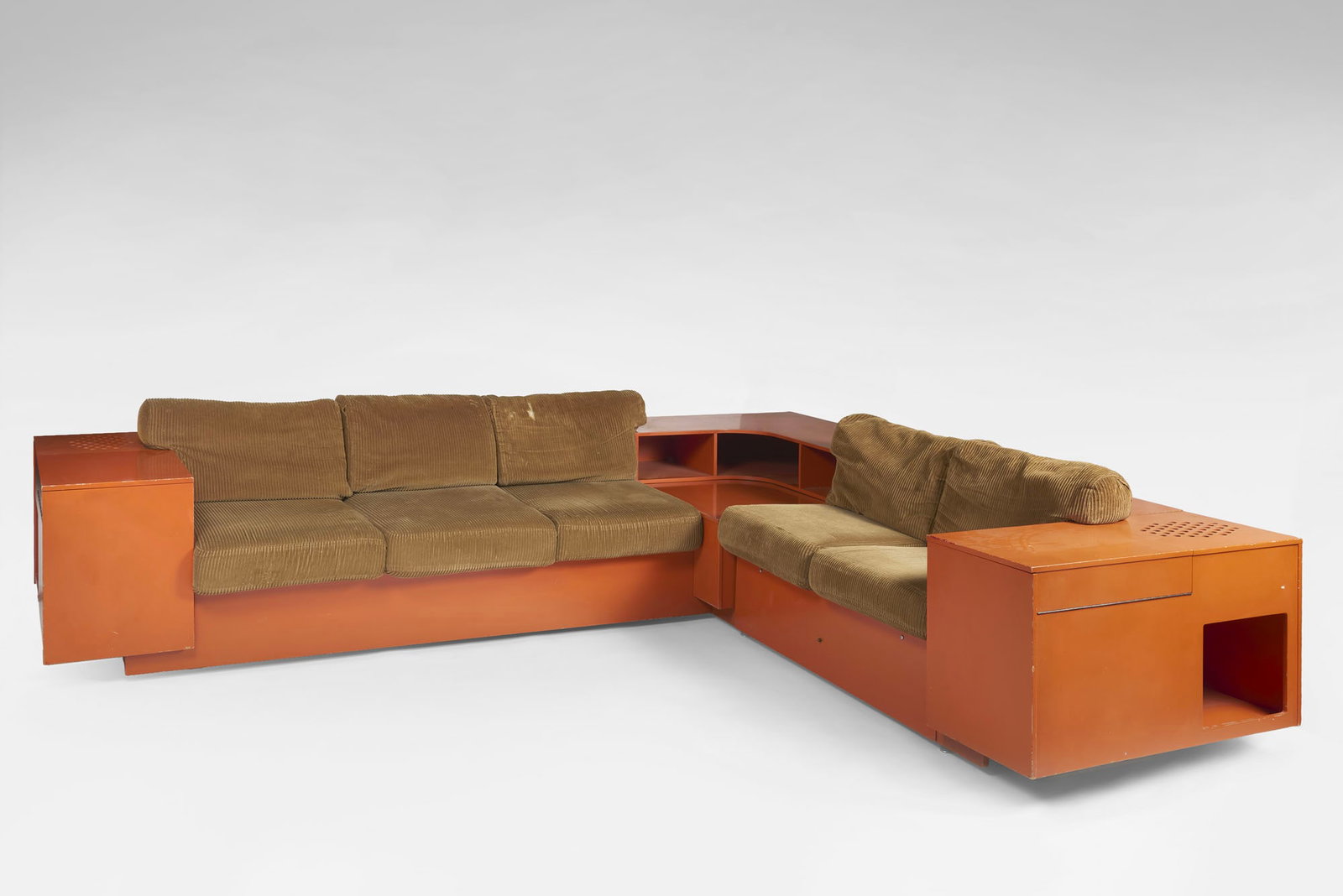 Bernini (Attributed) Five-seater corner sofa with side record players and bar compartments, a (1 of 1)
