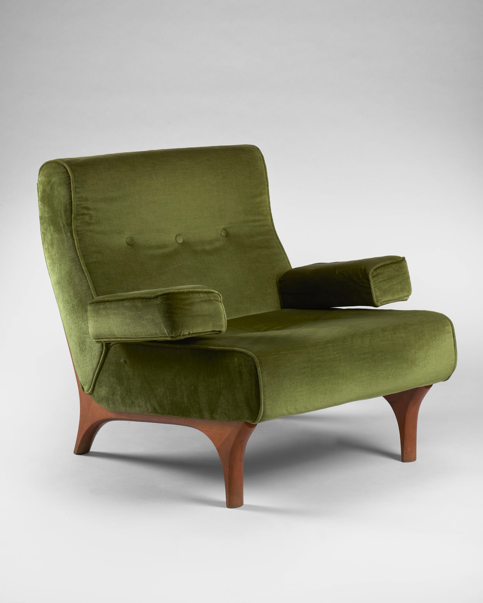 Eugenio Gerli (Milano 1923 - 2013) Armchair with solid wood shell and green velvet upholstery model: Eugenio Gerli (Milano 1923 - 2013) Armchair with solid wood shell and green velvet upholstery model "P73". Produced by Tecno, Varedo, 1950s. (83x78x83 cm.) (slight defects and restoration) Provenance 