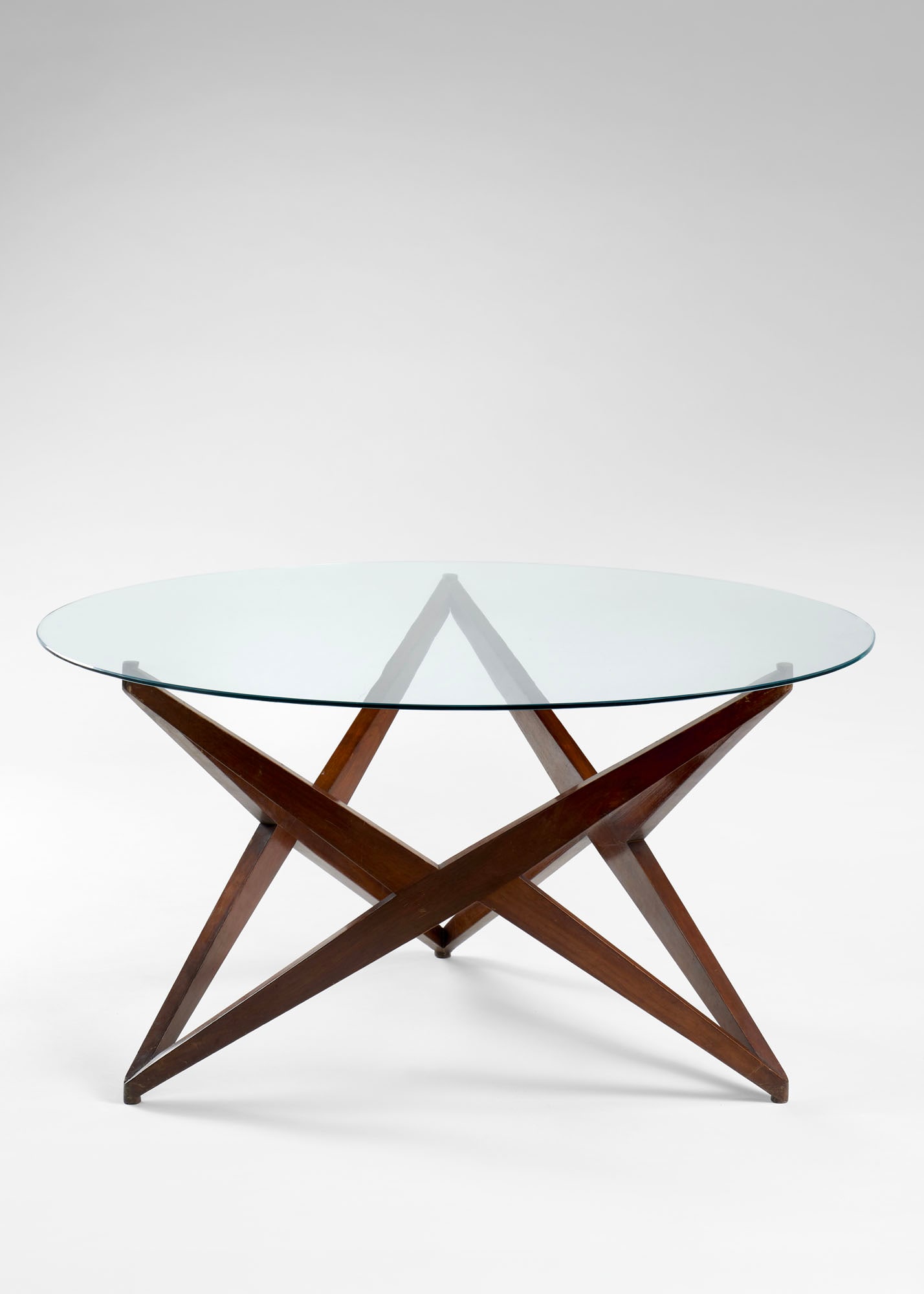 Angelo Ostuni Low table with a round top. Execution by Frangi, Italy, 1950s. Solid wood and glass. (1 of 2)