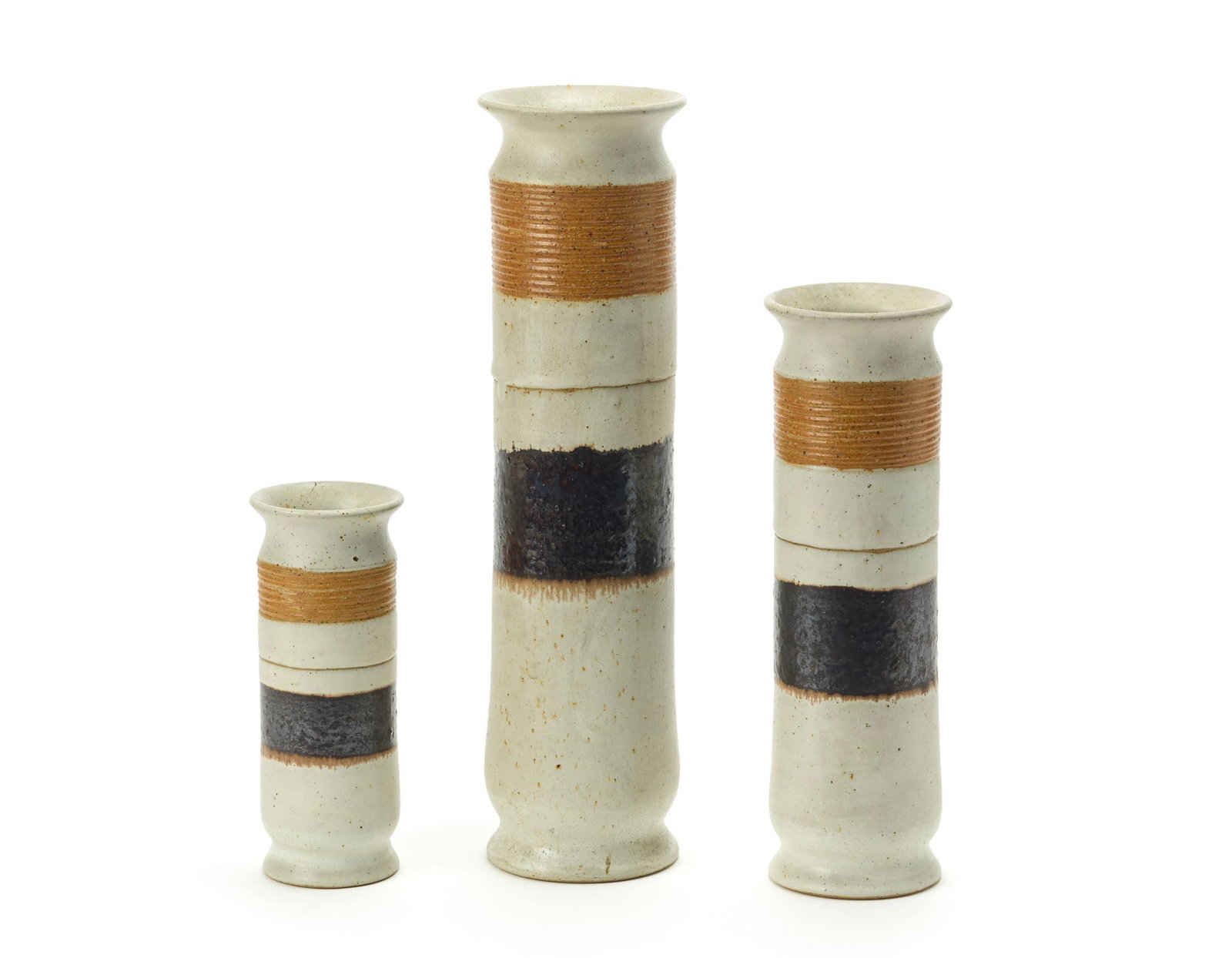 Bruno Gambone (Vietri Sul Mare 1936 - Firenze 2021) Three cylindrical vases in stoneware, glazed in (1 of 1)
