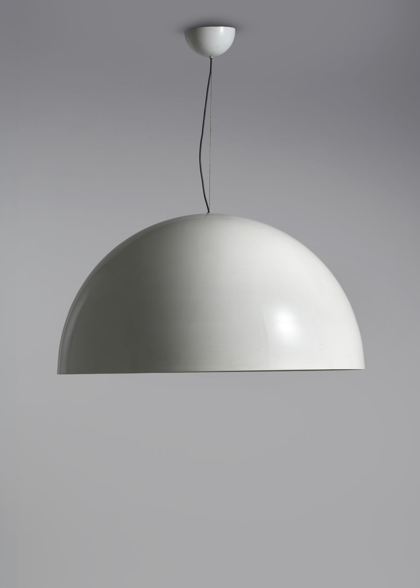 Vico Magistretti (Milano 1920 - 2006) Suspension lamp model "Sonora". Produced by O-Luce, Milan,: Vico Magistretti (Milano 1920 - 2006) Suspension lamp model "Sonora". Produced by O-Luce, Milan, 1970s/1980s. Shell in printed and white lacquered aluminum. (h 111 cm.; d 102 cm.) Provenance Aurelio Z
