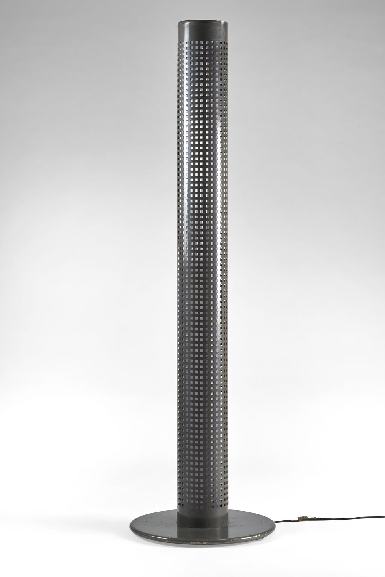 Bieffeplast (Attributed) Floor lamp. Italy, 1980s. Cylindrical structure made of perforated steel (1 of 1)