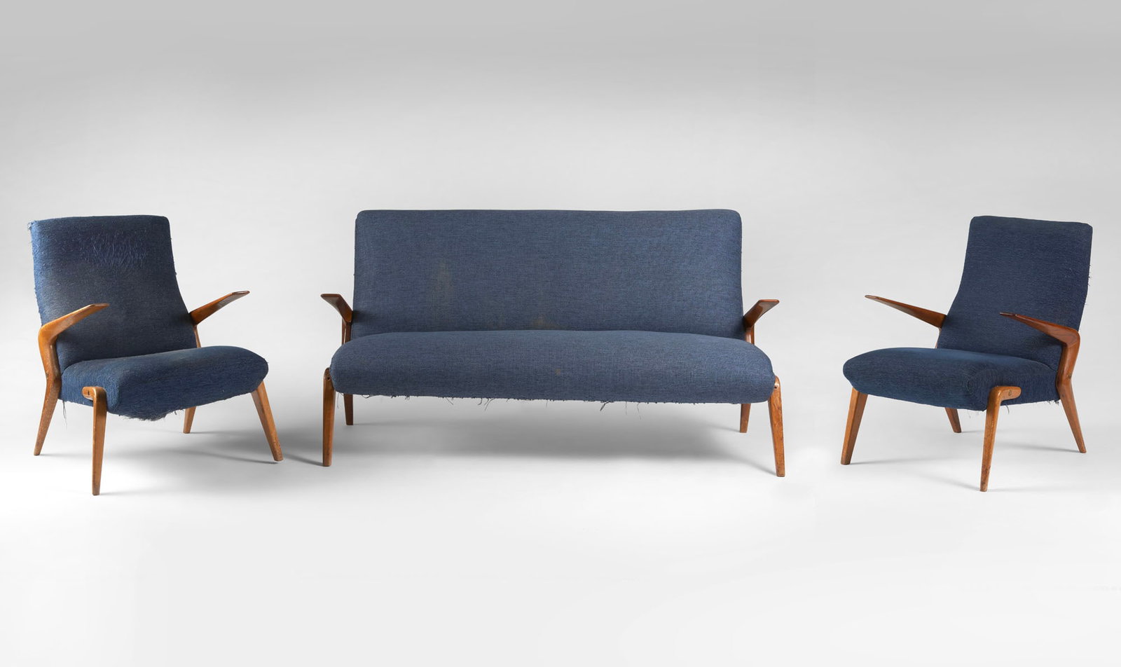 A living room set comprising a two-seater sofa and two armchairs inspired by Osvaldo Borsani’s (1 of 1)