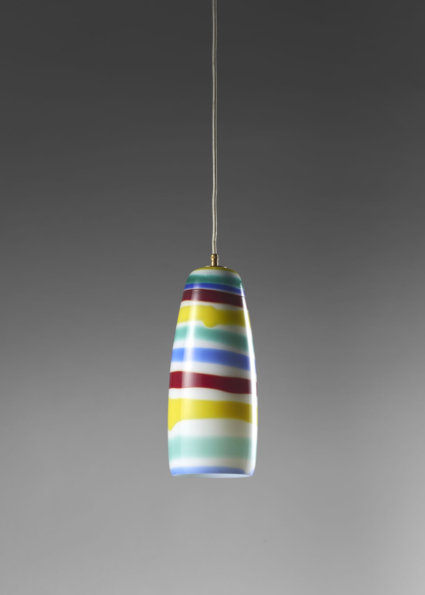Massimo Vignelli (Milano 1931 - New York 2014) * Suspension lamp model "4035". Manufacture of: Massimo Vignelli (Milano 1931 - New York 2014) * Suspension lamp model "4035". Manufacture of Venini, Murano, 1955ca. Blown glass jacketed with opaque bands of lattimo, blue, green, yellow and red. Li