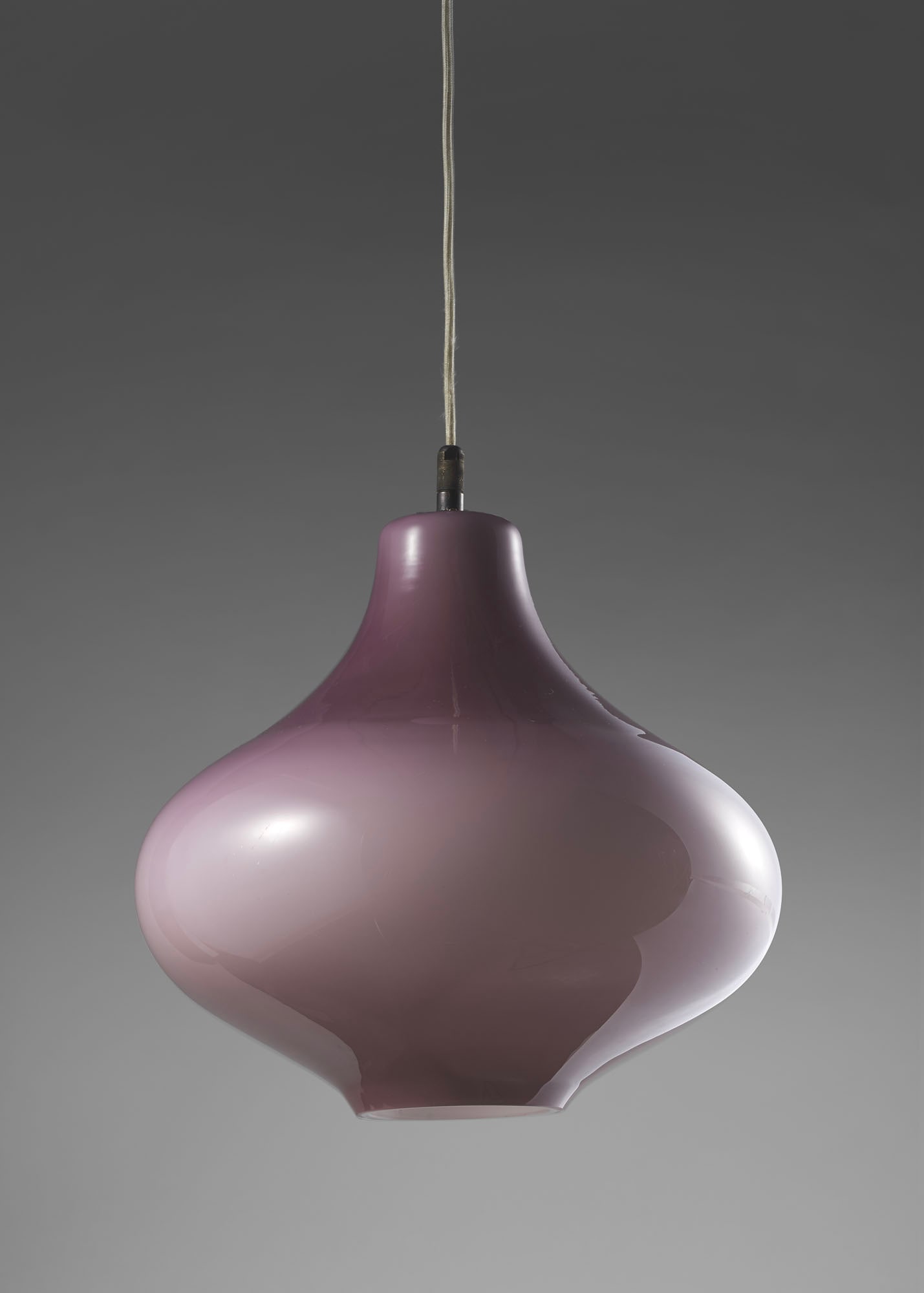Massimo Vignelli (Milano 1931 - New York 2014) * Suspension lamp model "4039". Manufacture of: Massimo Vignelli (Milano 1931 - New York 2014) * Suspension lamp model "4039". Manufacture of Venini, Murano, 1956ca. Matt opaque amethyst cased blown glass. Literature Venini Luce 1921-1985, a cura d