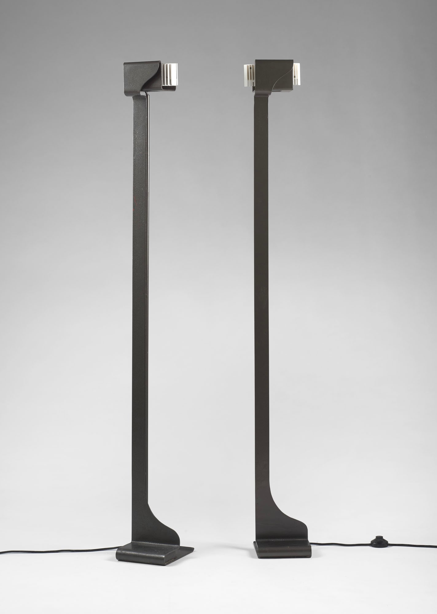 Luigi Caccia Dominioni (Milano 1913 - 2016) * Pair of floor lamps model "Cobra PL18". Produced by: Luigi Caccia Dominioni (Milano 1913 - 2016) * Pair of floor lamps model "Cobra PL18". Produced by Azucena, Milan, 1974ca. Metal painted in dark grey and light grey. (23.5 x 18 x h 172cm) IT * Coppia d