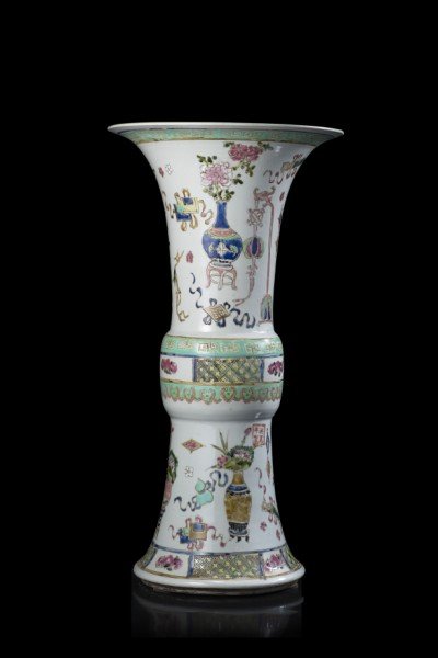 A Famille Rose vase, of archaistic gu shape, enamelled: A Famille Rose vase, of archaistic gu shape, enamelled with precious objects, Buddhist symbols and flowers, the interior turquoise China, 20th century (h. 55 cm.)
