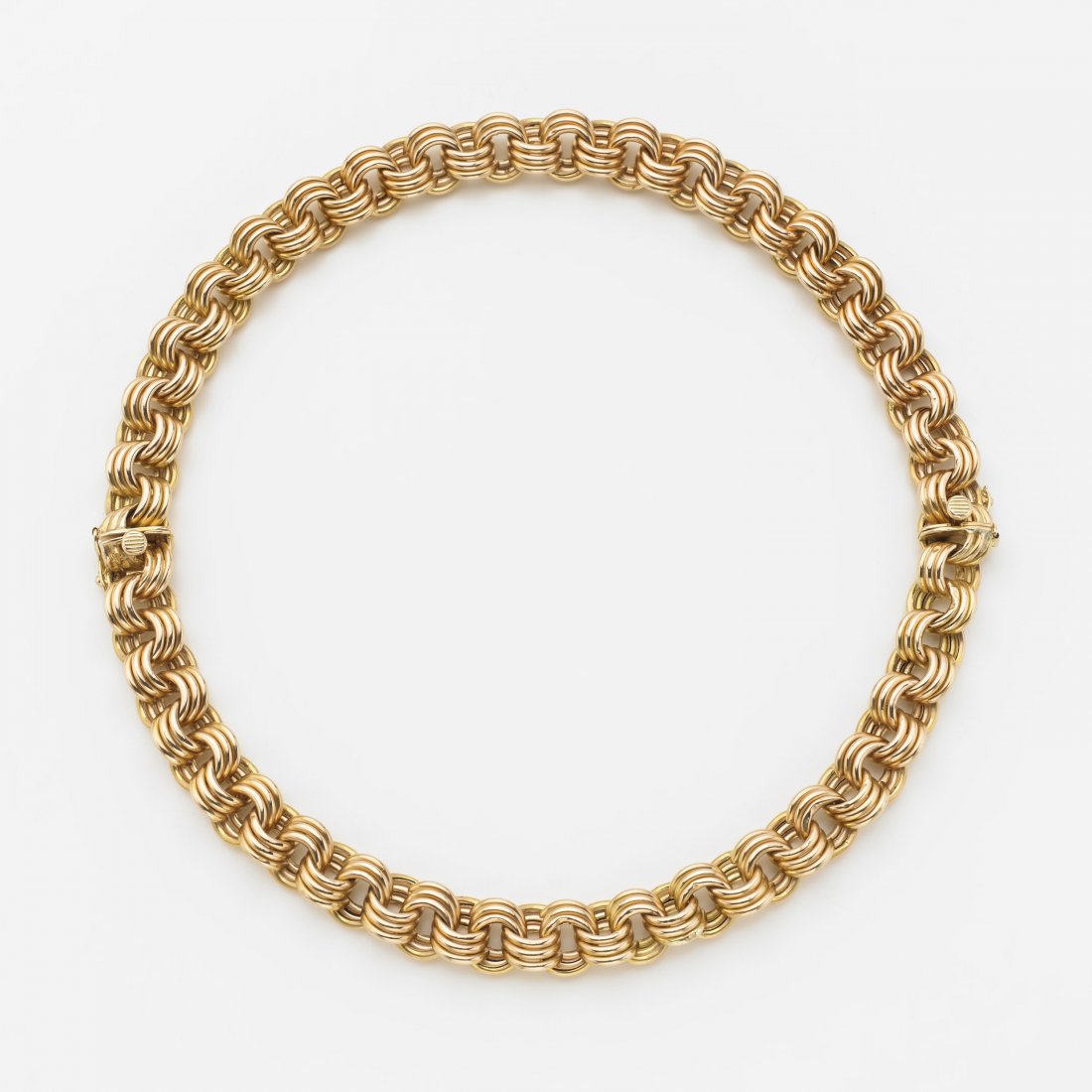 Due bracciali a catena unibili a formare un collier di: Due bracciali a catena unibili a formare un collier di cm 40 in oro rosso g. 42,90 Two red gold link chain bracelets that can unite into a necklace