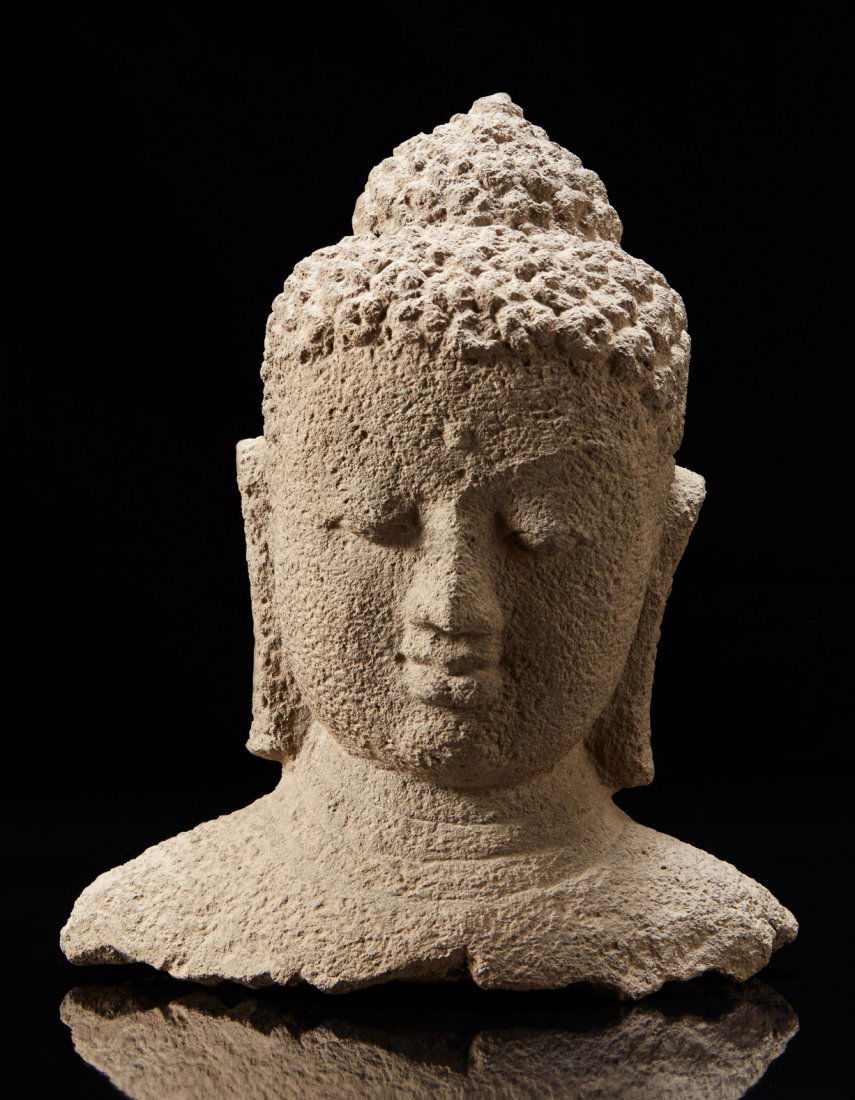 A grey stone buddha head (1 of 1)