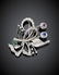 A diamond, ruby, emerald and sapphire white gold brooch