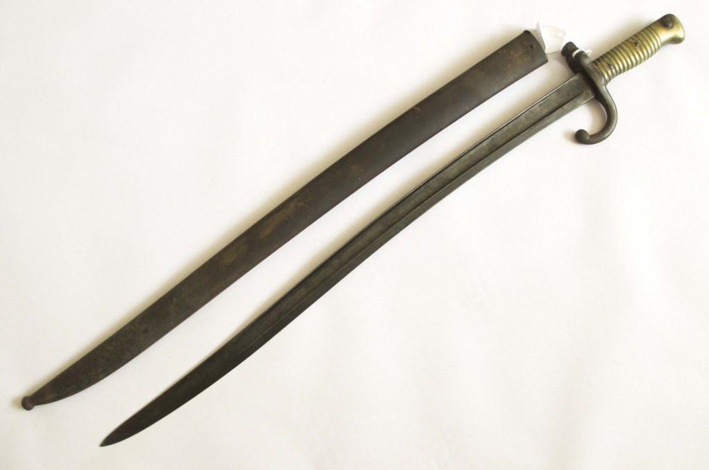 FRENCH BAYONET FOR THE CHASSEPOT RIFLE: FRENCH BAYONET FOR THE CHASSEPOT RIFLE In it's steel scabbard.