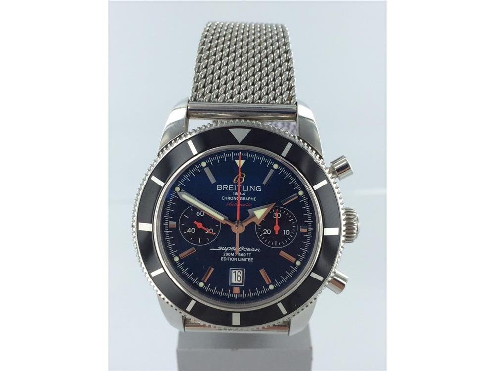 MENS S/S BREITLING SUPER OCEAN B&P: Pre owned stainless steel Breitling Superocean Heritage on steel bracelet. Blue dial. Black bezel. Limited edition 899/1000. Has box & papers. #A23320 #2312XXX.full size band