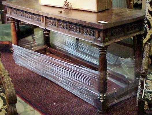Antique library table, heavily carved, made from
