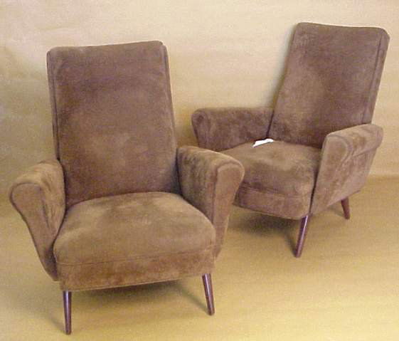 Batistin Spade / France,pr.of club chairs.Uph. &: Batistin Spade / France,pr.of club chairs.Uph. & wood. 35 1/2" x 33" x 27".Cond.,Uph. worn & arm on one is loose.