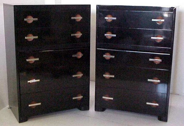 (Pr) Gilbert Rohde 5 drawer chests, blk. lac. w/: (Pr) Gilbert Rohde 5 drawer chests, blk. lac. w/ lac. brass pulls(refinished).47 1/2"x 32" x 20". Cond. minor suface wear.