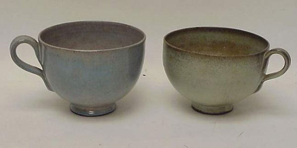 Edwin and Mary Scheier two large cups, signed on: Edwin and Mary Scheier two large cups, signed on underside, green cup is 3"h, approx 4 1/2"d, blue cup is as is (large crack) 3 1/2"h, 4 1/2"d