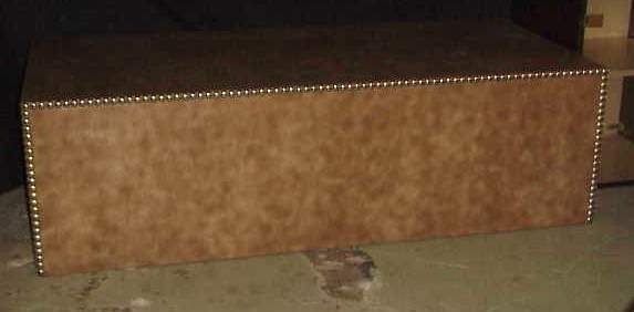 Attrib Karl Springer bench with steel tack edgin: Attrib Karl Springer bench with steel tack edging, 19"h, 64" x 29", some tacks are loose, missing small area of covering on back