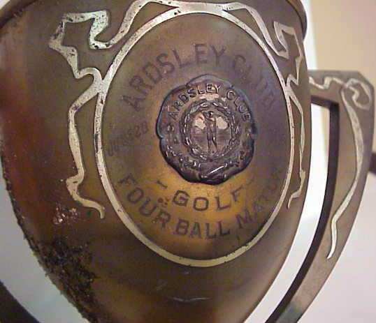 2 Heintz sterling on bronze trophy cups: 7 1/4" - 2
