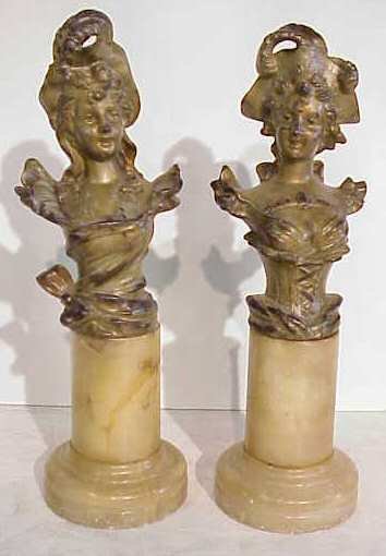 Pair of Victorian style gilt metal busts on onyx
