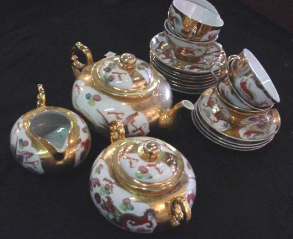 Chinese porcelain tea set on brass tray (minor c