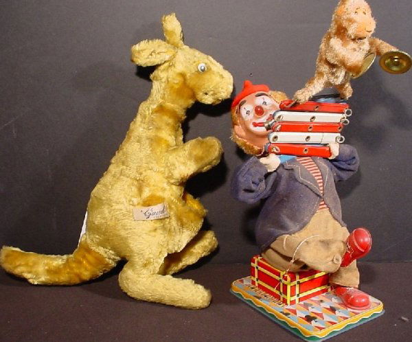 2 vintage toys including clown with mechanical: 2 vintage toys including clown with mechanical monkey 14"h and a Gund stuffed kangaroo 13"h