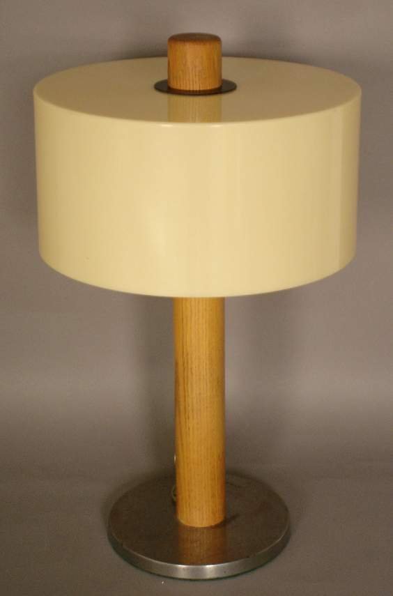 Raymor Table lamp,poss. Russell Wright ,oak stem &: Raymor Table lamp,poss. Russell Wright ,oak stem & finial plated metal base & plastic shade.Marked on underside,Raymor No. 9.measures,20 1/2"h. to top of finial.( later power cord,oxidation to base )