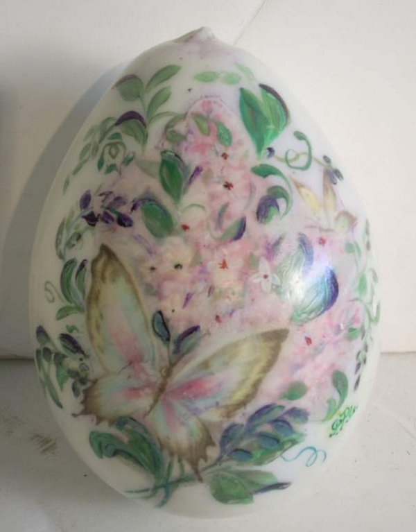Hand painted glass egg decorated with butterfly