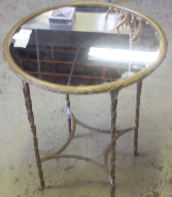 Pair of laurel wreath bronze guideron tables with