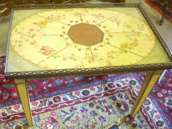 Paint decorated cocktail table with metal gallery