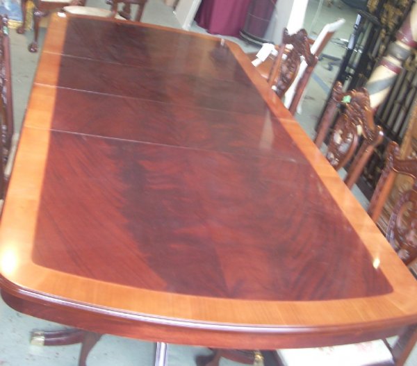 Duncan Phyfe style banded mahogany double pedesta: Duncan Phyfe style banded mahogany double pedestal dining table 74" closed, 109" open with two leaves, 46 1/2" w